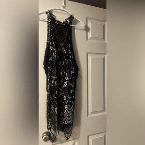 Sz small cold shoulder black crochet design overlay dress with nude color slip.